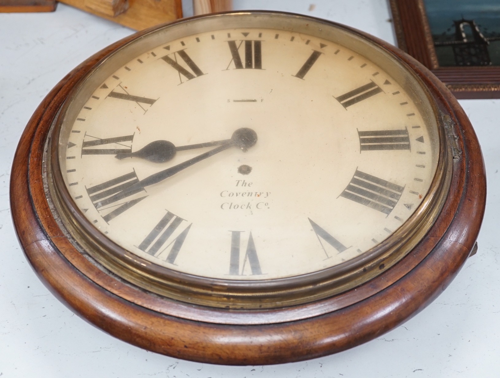 A Victorian dial clock retailed by The Coventry Clock Co. 37cm diameter